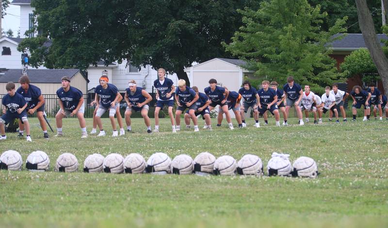 Members of the Fieldcrest football team work on drills on Monday, July 8, 2024 at Fieldcrest High School.