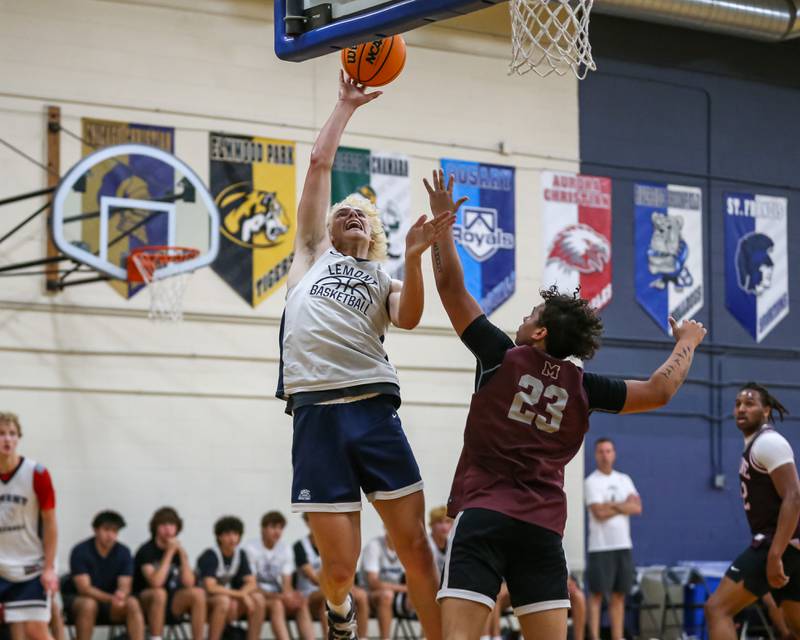 Lemont's Ryan Crane puts in a layup at the Riverside-Brookfield Summer Shootout basketball tournament. June 22, 2024.