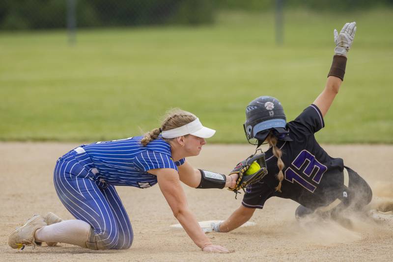 Newark's Ryan Williams tags out Serena's Brynley Glade on an attempted steal in the top of the eighth inning of the Class 1A Woodland Sectional contested Friday, May 24, 2024, in rural Streator.