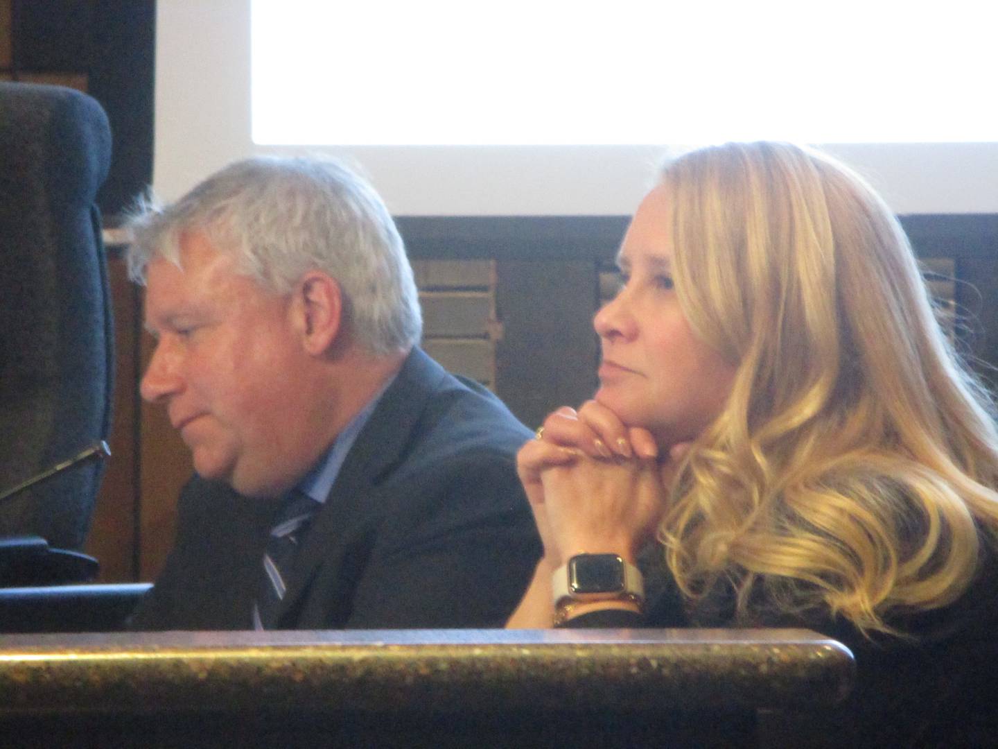 Joliet City Manager Beth Beatty and City Attorney Chris Regis listen to discussion of the city's new ordinance regulating potential asylum-seeker buses during the City Council meeting on Tuesday, Jan. 2, 2024.
