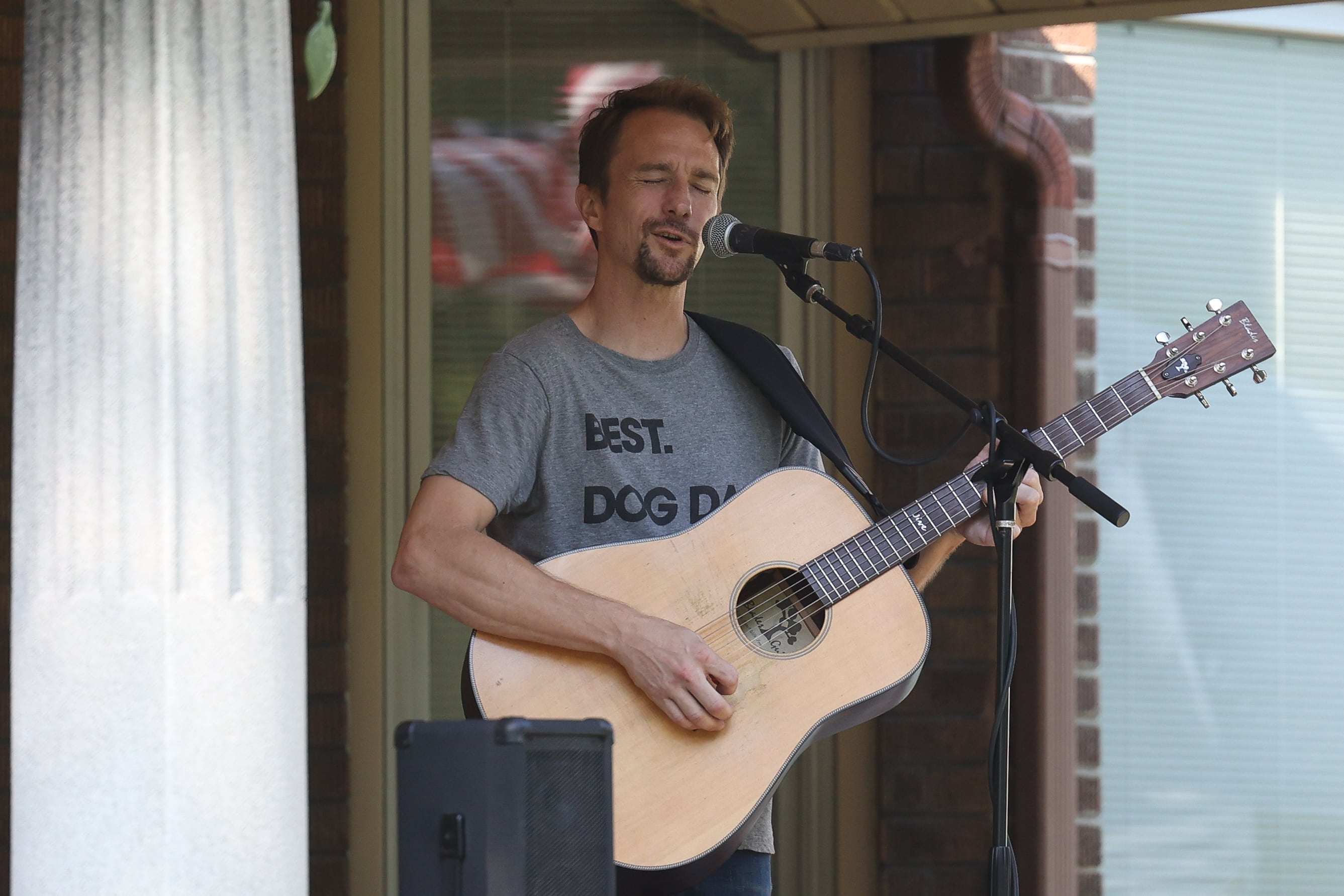 Pete Jive performs on a porch of a home on the 600 block of Campbell Street at the annual Porch and Park Music Fest in the Upper Bluff Historic District in Joliet, Aug. 19, 2023.