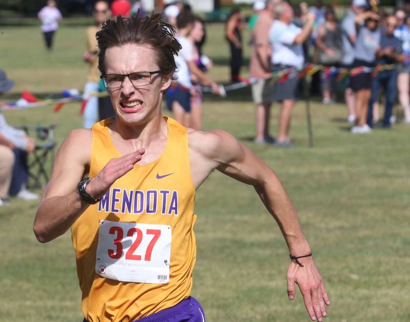 Mendota's Anthony Kelson wins the boys race during the Gary Coates Cross Country Invitational on Saturday, Sept. 14, 2024 Zearing Park in Princeton.