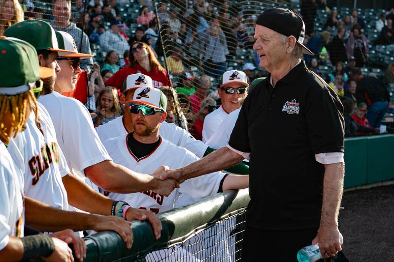 Bill Murray shakes hands with the team prior to the Joliet Slammers home opener Friday May 10, 2024 at Duly Health and Care Field in Joliet