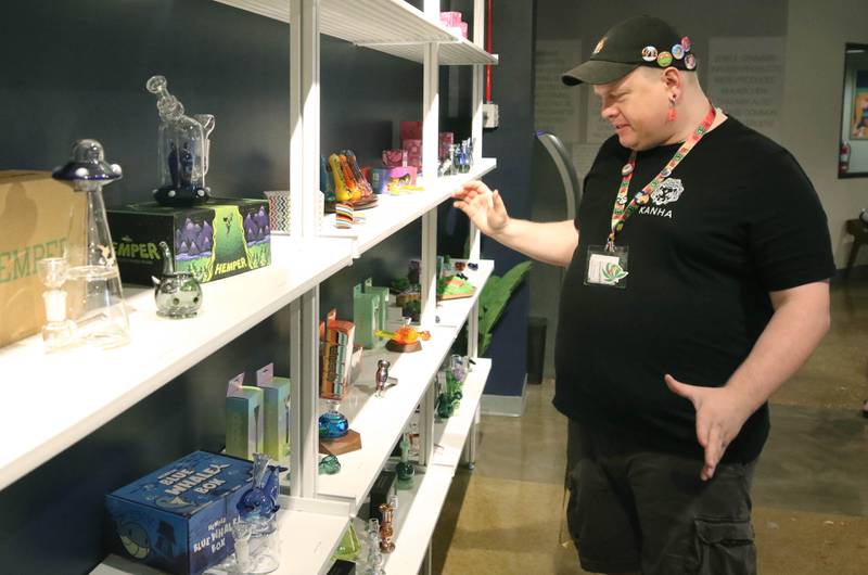 Joe Degand, brand agent in charge at nuEra cannabis dispensary, talks Thursday, May 23, 2024, about some of the products available at the new business in DeKalb. Thursday was opening day for the dispensary which is located at 818 West Lincoln Highway, in the Junction Shopping Center.