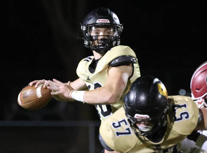 Sycamore's Burke Gautcher throws a pass during their game against Morris Friday, Oct. 18, 2024, at Sycamore High School.