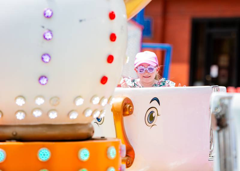 Penny, 4, (mother did not want to reveal last name) of Darien, rides the teacups during the Downer’s Grove Rotary Fest, Saturday, June 22, 2024.

Suzanne Tennant/For Shaw Local News Media