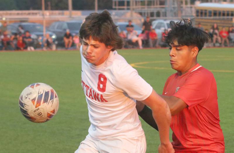 Ottawa's Mason Jaegle gets in front of L-P's Alex Rax on Wednesday, Sept. 18, 2024 at the L-P Athletic Complex in La Salle.