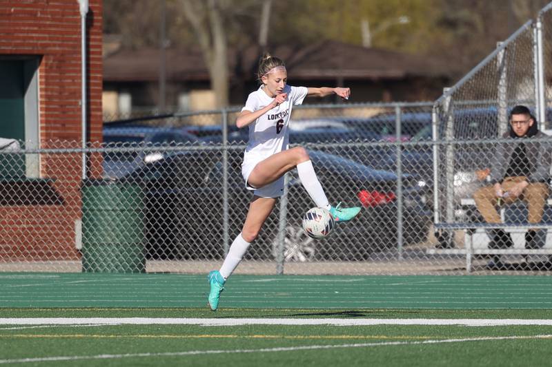 Lockport’s Ava Kozak works the ball along the sidelines against Plainfield Central on Friday, April 5, 2024.