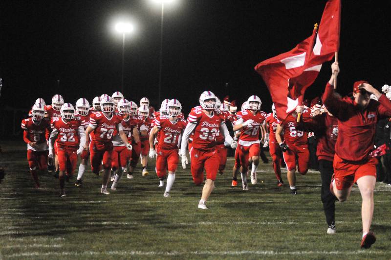 Ottawa takes the field before playing Rochelle at King Field on Friday, Oct. 18, 2024.