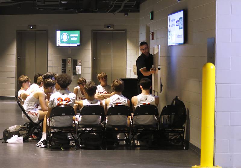 McHenry Head Couch Chris Madson talks to his team at halftime during a non-conference basketball game against Johnsburg Sunday, Nov. 27, 2022, at Fiserv Forum in Milwaukee.