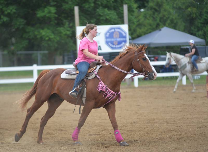Lexi Moan, 16, of Amboy warms up Digger as they wait to compete at the WHOA benefit horse show on Saturday, June 22, 2024 at the Whiteside County fairgrounds in Morrison.