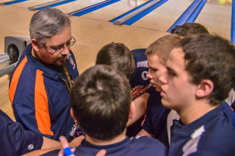 Romeoville Coach Tony Talley gives a quick pep-talk between games at the IHSA Boys Bowling Regionals