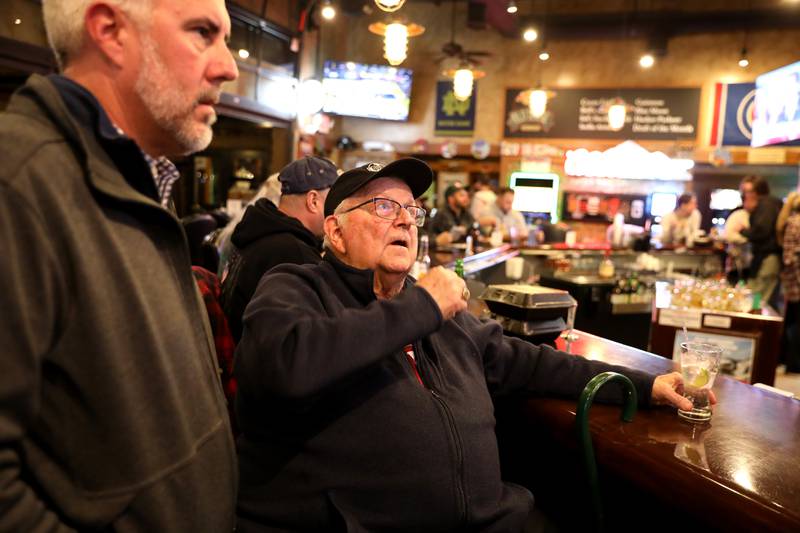 Kane County Board District 16 Republican incumbent Mike Kenyon (right) waits for election results with Kane County Board District 18 Republican incumbent Rick Williams at Old Towne Pub and Eatery in Campton Hills on Tuesday, March 19, 2024.