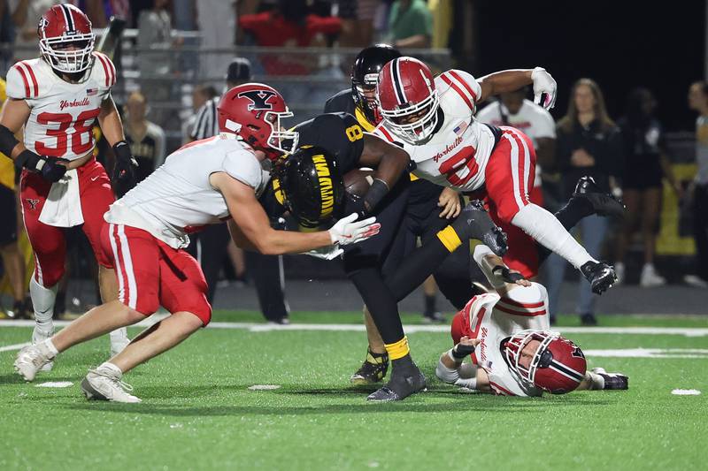 Yorkville’s defense brings down Joliet West’s Taivaughn Johnson on Friday, Sept. 13, 2024 in Joliet.