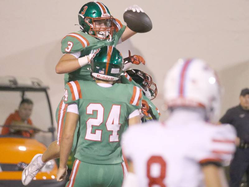 L-P's Michael Hartman leaps in the air to celebrate scoring the teams second touchdown with teammate eEaston Moriarity against Ottawa on Friday, Sept. 13, 2024 at Howard Fellows Stadium.