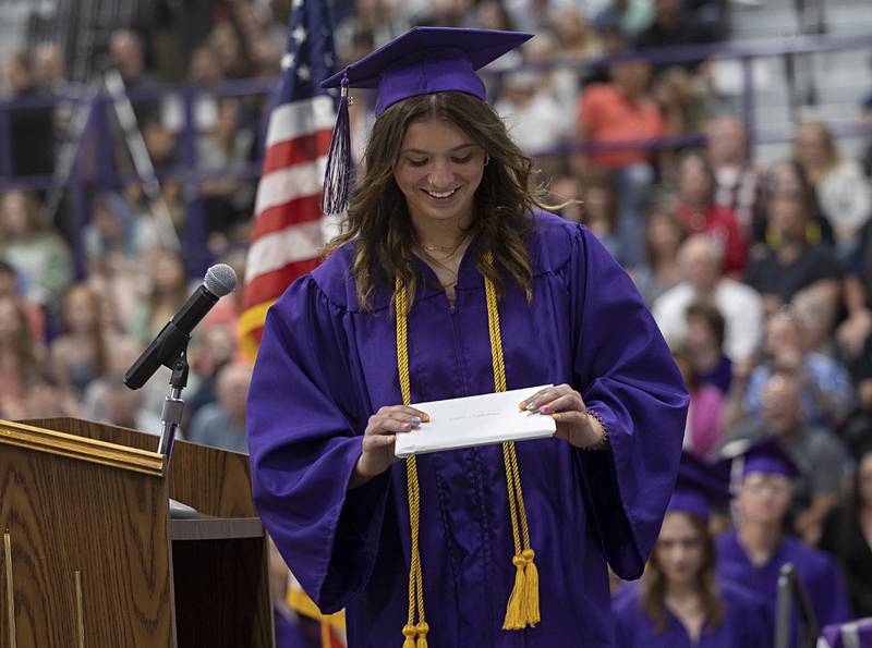 Layni Lappin smiles after accepting her diploma at Dixon High School Sunday, May 26, 2024.