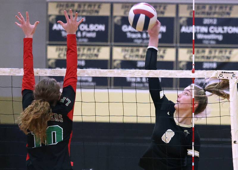 Sycamore's Ava Carpenter tries to spike the ball past LaSalle-Peru's Katie Sowers during their match Tuesday, Oct. 10, 2023, at Sycamore High School.