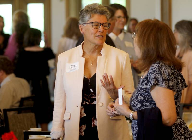 Award recipient Trudy Wakeman talks with Sharon Schoenecker at the Northwest Herald's Women of Distinction award luncheon Wednesday June 5, 2024, at Boulder Ridge Country Club, in Lake in the Hills. The luncheon recognized 11 women in the community as Women of Distinction.