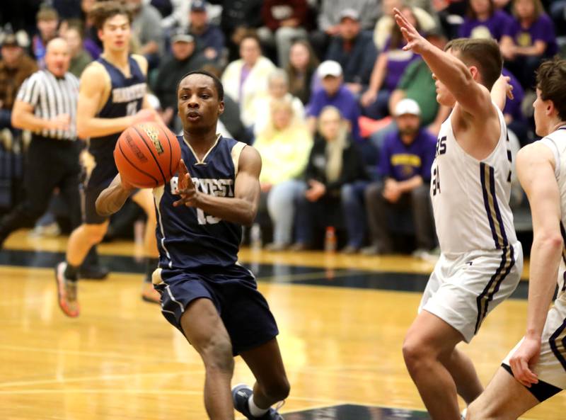 Harvest Christian Academy’s Elijah Bell passes the ball during the Class 1A Harvest Christian Academy Sectional semifinal game against Serena on Wednesday, Feb. 28, 2024 in Elgin.