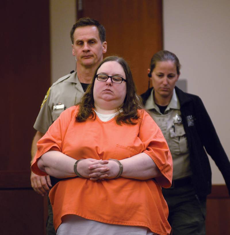 Sarah Safranek is escorted into an Ogle County courtroom by two deputies for a pretrial motion hearing on Friday, June 28, 2024 in Oregon.