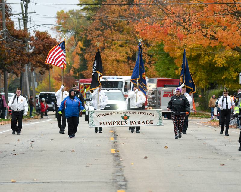 Sycamore’s American Legion Post No. 99 members kick off the Sycamore Pumpkin Festival parade by presenting the American flag colors along the parade route held on Sunday, Oct. 29, 2023.