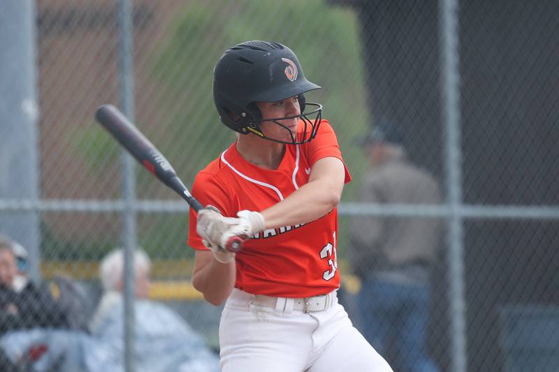 Lincoln-Way West’s Reese Cusack locks in on a pitch against Lincoln-Way Central on Tuesday, May 14, 2024 in New Lenox.