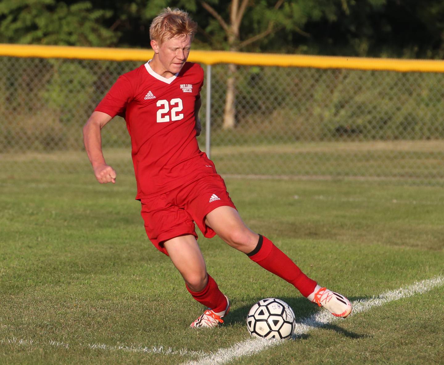 Streator's Connor Decker saves the ball from going out of bounds against Bloomington Central Catholic on Wednesday, Aug. 23, 2023, at St. James Street Recreation Area in Streator.