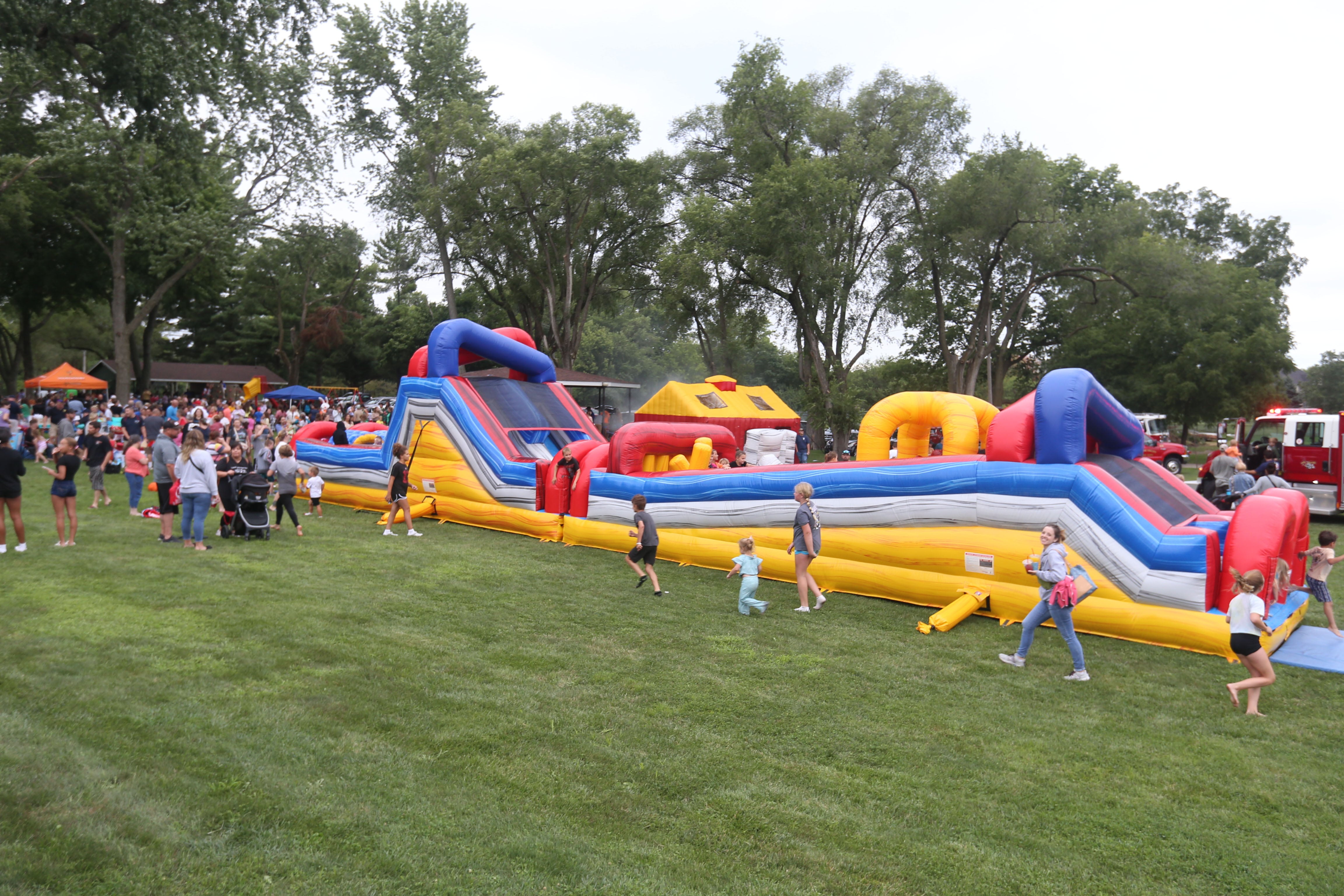 A gigantic 70-foot bounce house was one of the many activities for children to during  the National Night Out event on Tuesday, Aug. 6, 2024 at Kirby Park in Spring Valley.