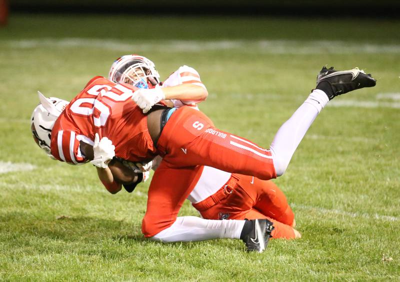 Ottawa's Brayton Lehr brings down Streator's Sharonn Morton on Friday, Sept. 6, 2024 at Doug Dieken Stadium.