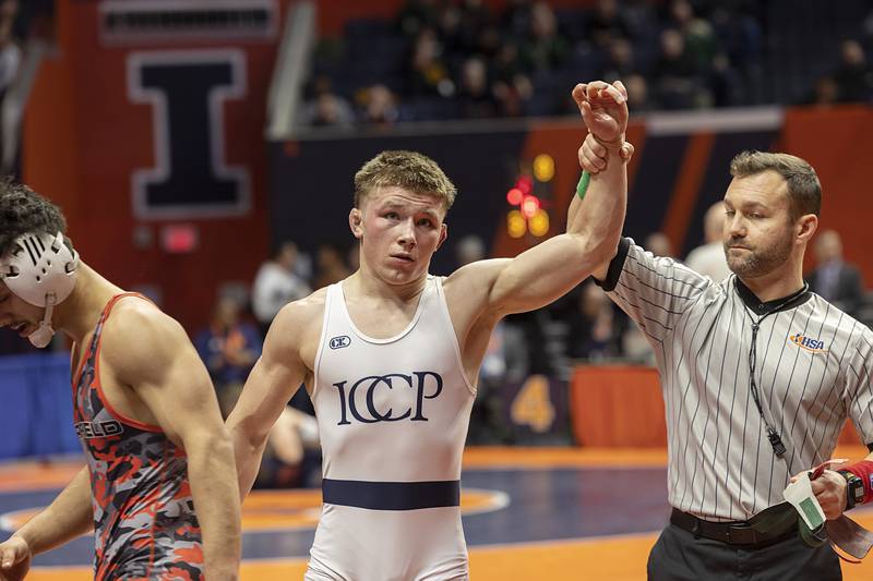 IC Catholic’s Pat Mullen wins his match over Mark Martinez of Deerfield in the 144 pound third place 2A match Saturday, Feb. 17, 2024 at the IHSA state wrestling finals at the State Farm Center in Champaign.