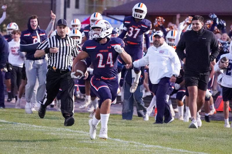 Oswego’s Ayden Villa (24) scores a touchdown on a run against Joliet Catholic during a football game at Oswego High School on Friday, Sep 6, 2024.