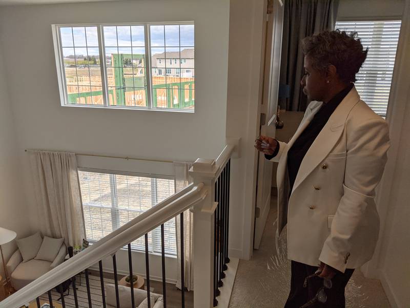 Home at Ashcroft property manager Nicole Ingram gives a tour of one of the model homes at Home at Ashcroft, a new townhouse rental community in Oswego.