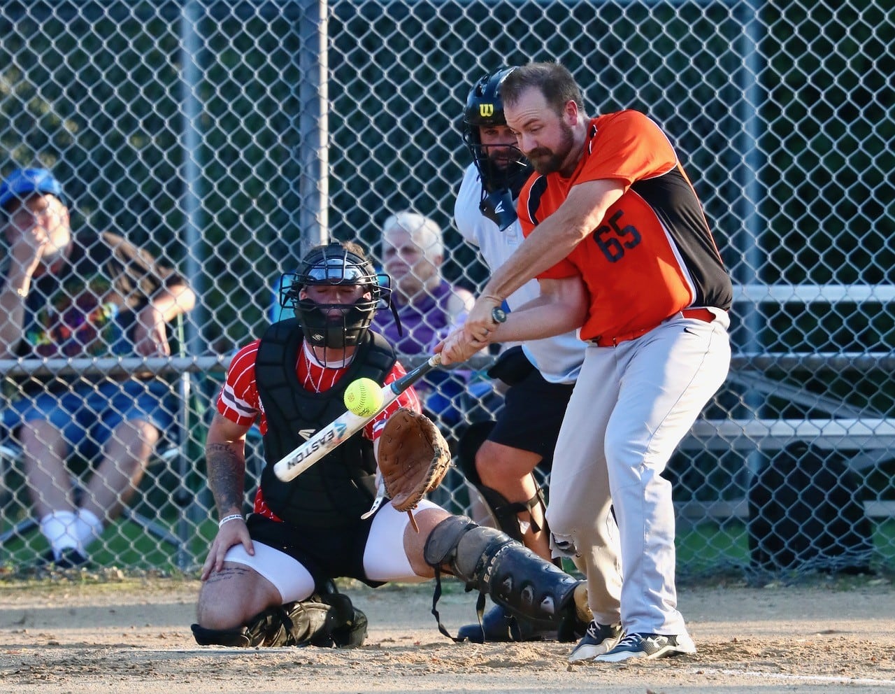 Andy Austin of People's Church takes his cuts in Friday's Princeton Park District Fastpich League tournament play at Westside Park.