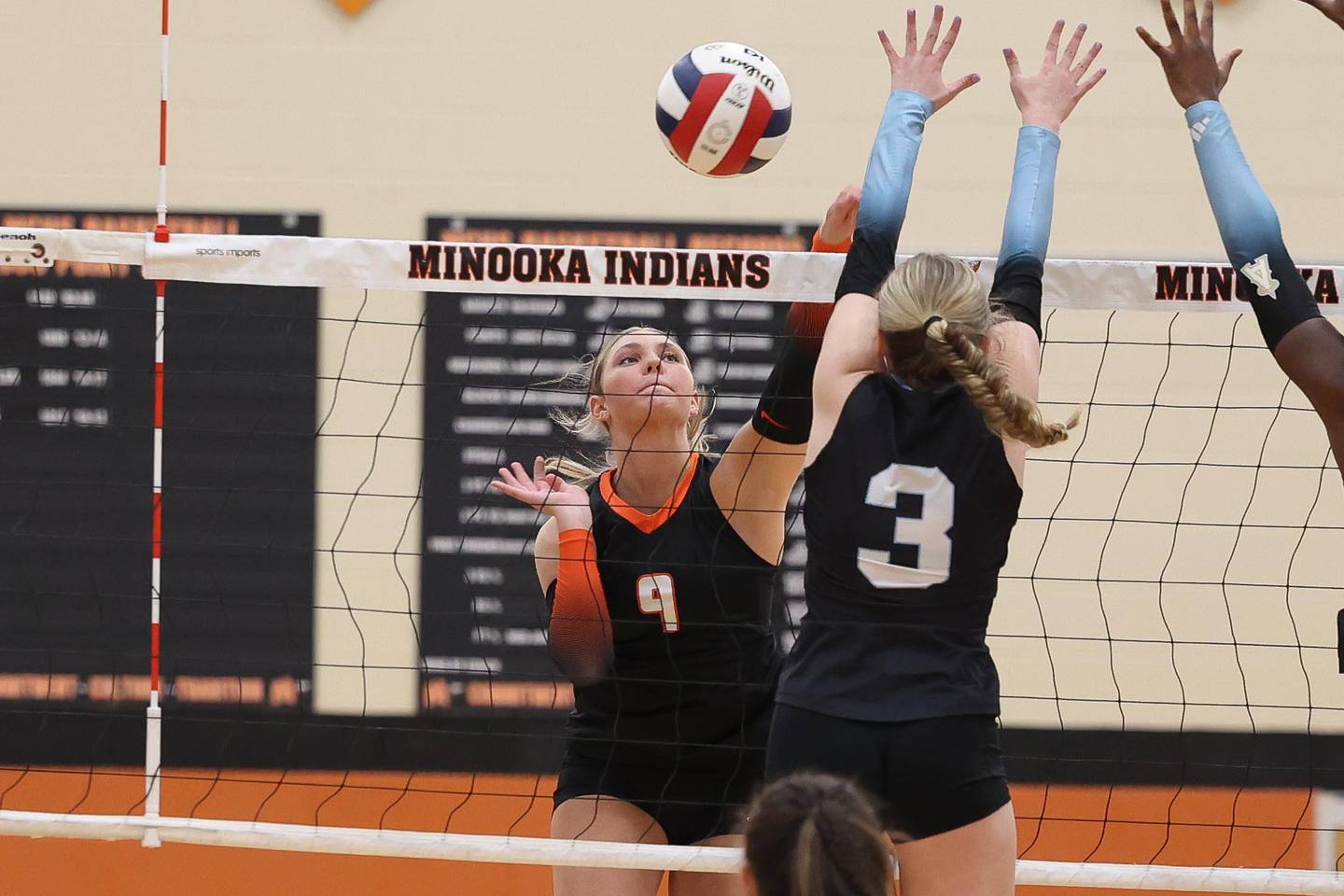 Minooka’s Ella Carlson hits a shot against Joliet Catholic on Wednesday, Sept. 4, 2024 in Minooka.