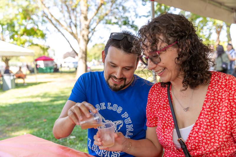 Jose and Raquel Guerrero from Chicago enjoy some beer at the Berywn Brewfest. Sept 14, 2024 in Berwyn.