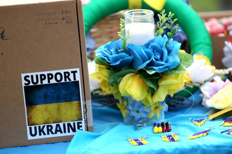 Together, representatives from the City of Elmhurst, Elmhurst District 205, Elmhurst Park District, Elmhurst Public Library and Elmhurst University gathered with community members at Wilder Park in Elmhurst to show support for the people of Ukraine on Wednesday, April 6, 2022.