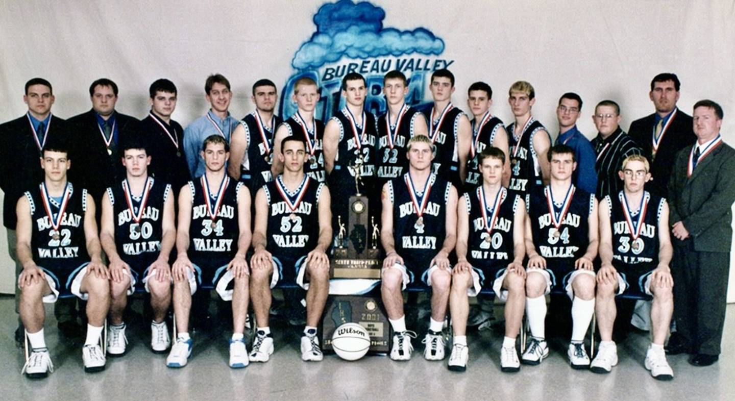 The 2000-01 Storm basketball team was the second from Bureau Valley to reach State and placed third-place basketball team. Team members are (front row, from left) Chad Dever, Jim Marlowe, Mike Jacobs, Mike Behrens, Reuben Slock, John Elliott, Matt Hewitt and Jack Creason; and (back row) assistant coach Jason Stabler, assistant coach Nick Hartz, manager Jared Draper, manager Luke Nelson, Greg Cooley, Brandon Bowman, Adam Gutshall, Phil Endress, Nathan Koning, Reid Oberle, Mike Jesiolowski, manager Jacob King, manager Kris Wilcoxen, head coach Brad Bickett and assistant coach Bret Helms.