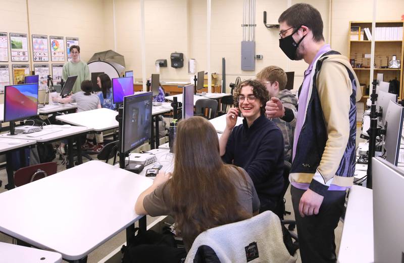 Educator Gregory D'Addario, who teaches TV production and english at Sycamore High School, goes over some ideas for a movie scene recreation with students in his class Wednesday, March 1, 2023, at the school.