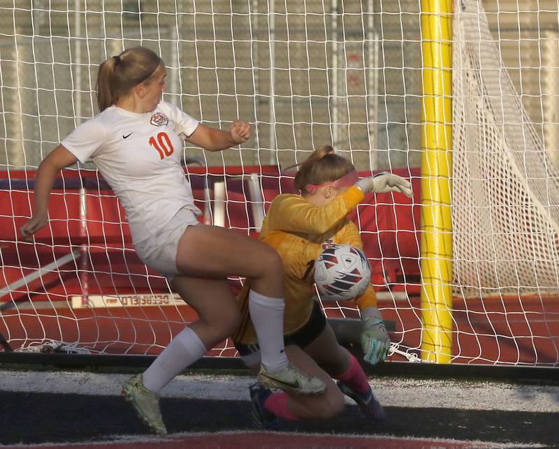 Crystal Lake Central's Brooklynn Carlson tries to score a goal against St. Ignatius College Prep's Ava Stern during the Class 2A Deerfield Supersectional girls soccer match on Tuesday, May 28, 2024, at Deerfield High School.