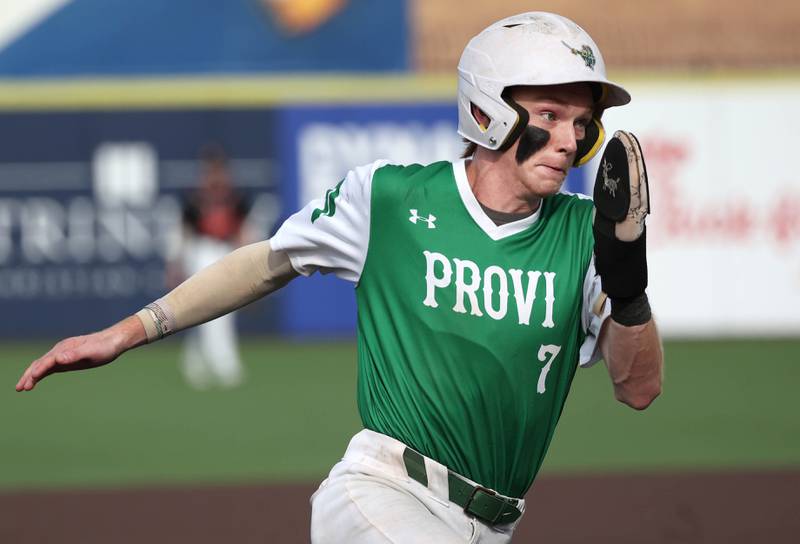 Providence Catholic's Nolan Galla heads to third during their Class 4A state semifinal game against Edwardsville Friday, June 7, 2024, at Duly Health and Care Field in Joliet.