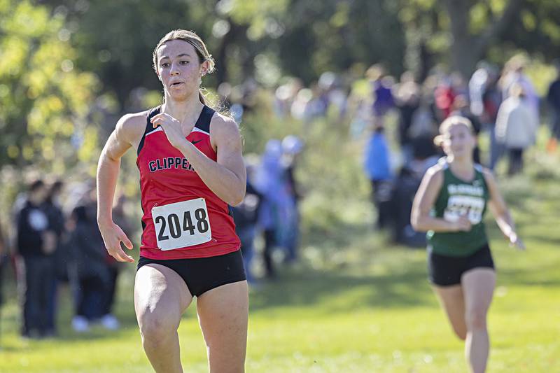 Amboy’s Aubrey Wells heads for the finish Monday, Oct. 9, 2023 during the 50th Amboy Columbus Day Cross Country Invite.