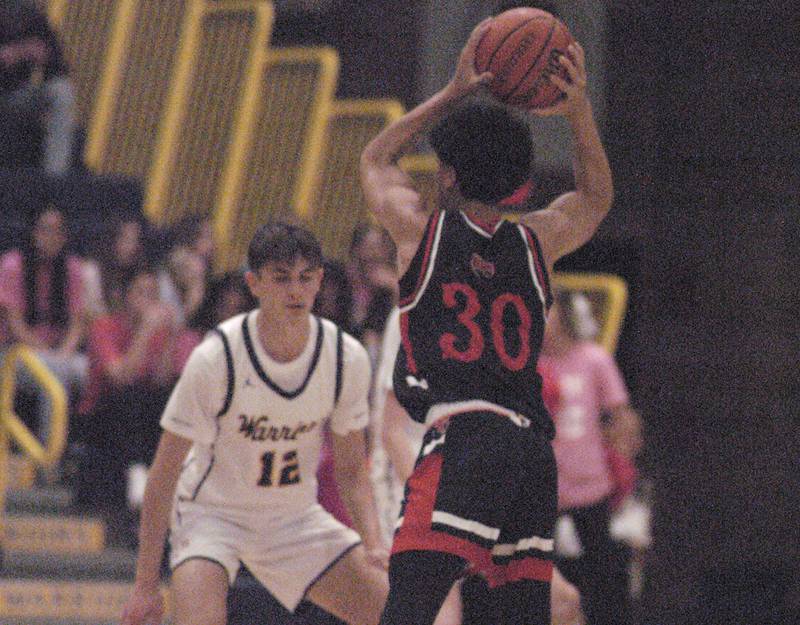 Sterling  player Carter Chance  applies defensive to United Township's Caeden Terrell dring their game Friday, Feb. 9, 2024 at Sterling High School