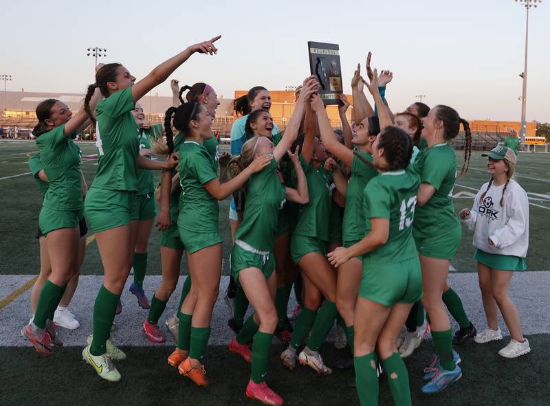 York celebrates winning the Class 3A Morton regional girls soccer final between Downers Grove South and York in Berwyn on Friday, May 17, 2024.