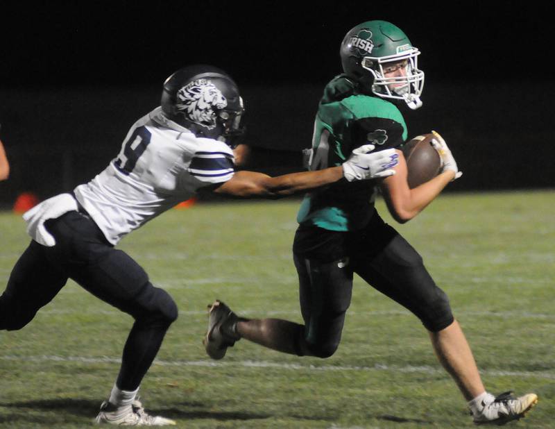 Seneca's Brody Rademacher evades Lisle's Cardell Hicks at Seneca on Friday, Sept. 6, 2024.