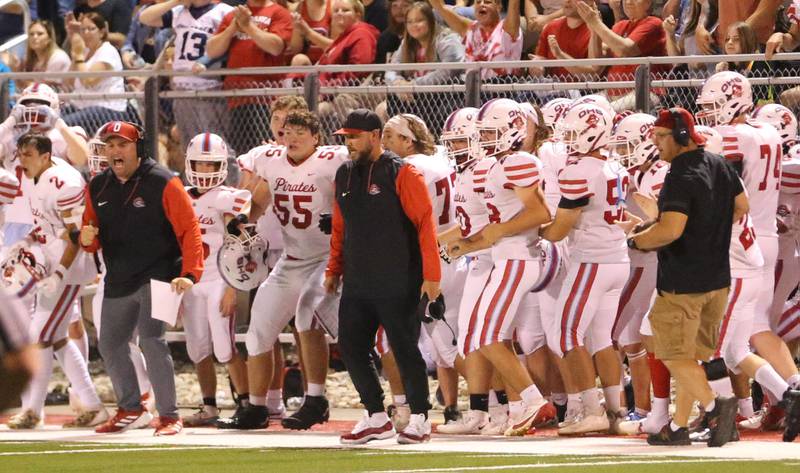 Ottawa players and coaches react after the Pirates caused a fumble in the first quarter against L-P on Friday, Sept. 13, 2024 at Howard Fellows Stadium.