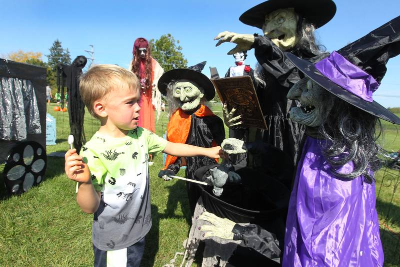 William Rail, 5, of Round Lake checks out some witch decorations in the Field of Screams during the Fall Festival at Grant Township Center on October 1st in Ingleside. The event was sponsored by the Village of Fox Lake and Grant Township.
Photo by Candace H. Johnson for Shaw Local News Network