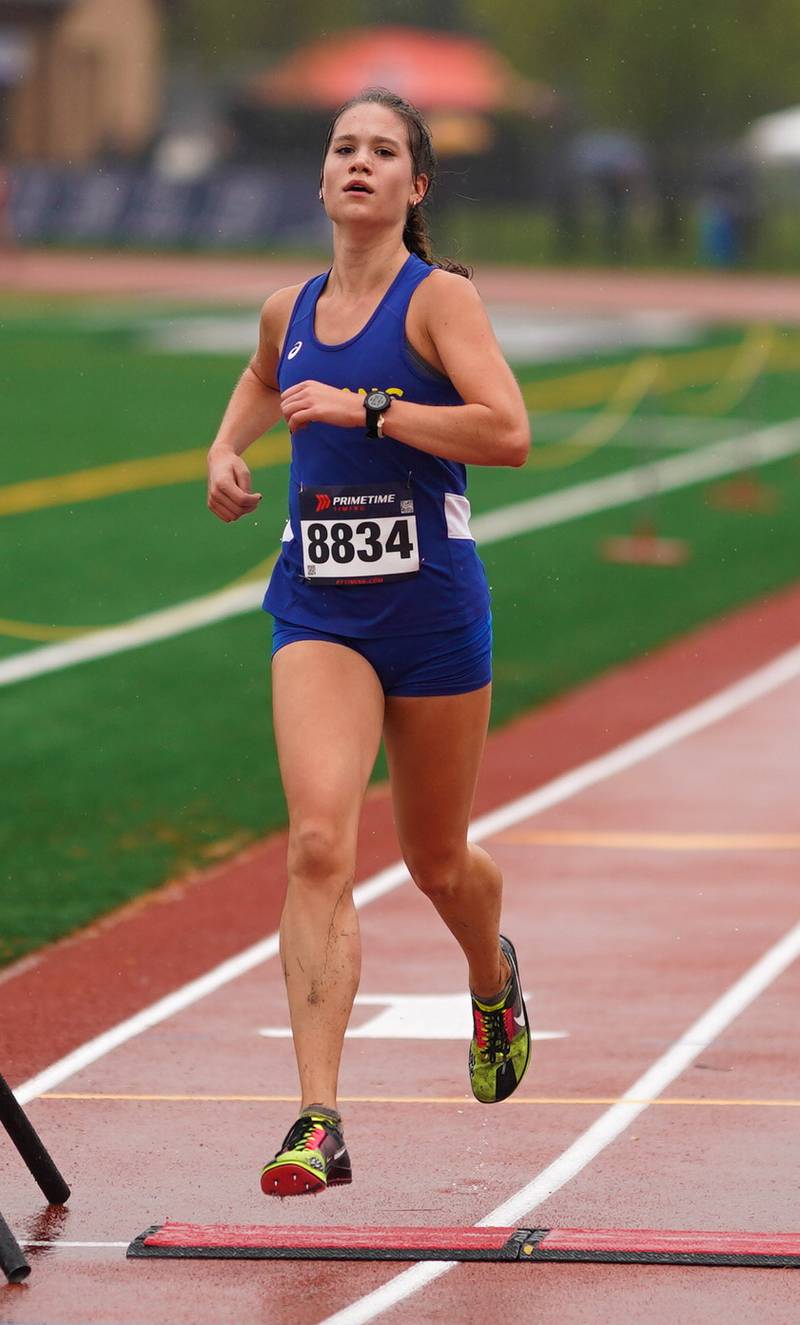 Wheaton North’s Maddie Romaine crosses the finish line with a fourth place time of 18:38.1 during the DuKane Conference Cross Country Championships at Lake Park High School in Roselle on Saturday, Oct. 14, 2023.