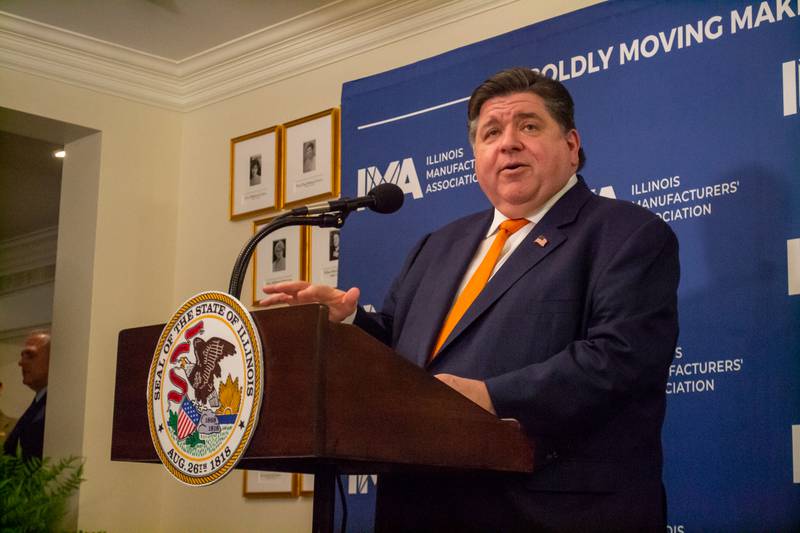 Gov. JB Pritzker speaks at an event at the Governor’s Mansion in Springfield on Tuesday, May 7. On the same day, his office sent a memo to state agency directors asking them to identify $800 million in budget cuts.
