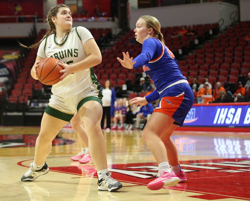 St. Bede's Savannah Bray dribbles inside the lane as Okawville's Madisyn Wienstroer defends during the Class 1A State semifinal game on Thursday, Feb. 29, 2024 at CEFCU Arena in Normal.