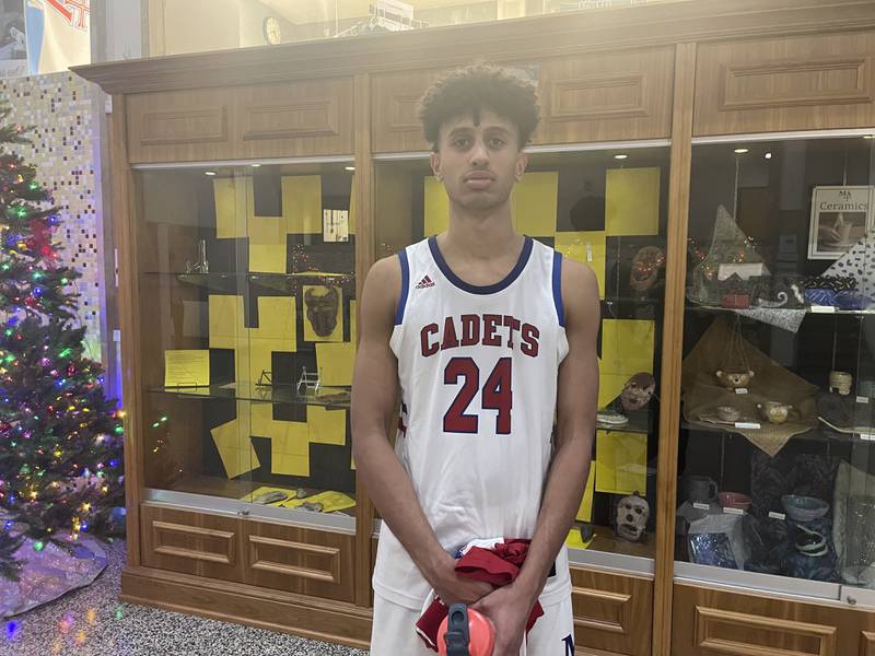 Marmion senior forward Trevon Roots following the Cadets' 58-28 win over Chicago Leo on Dec. 13. Photo by Jacob Bartelson.